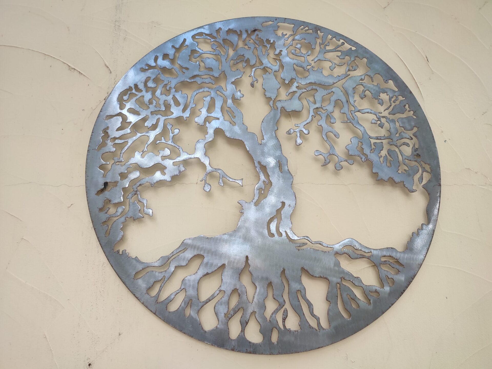 Jardin Coubertin logo metal